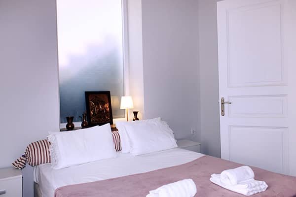 Bright and cozy living room of Flora’s Memories Apartment in central Kavala.