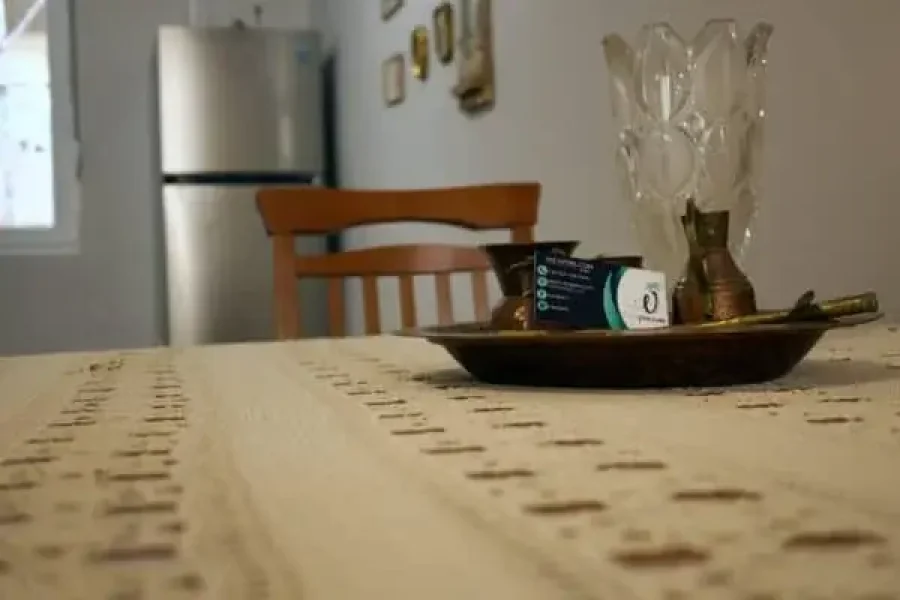 Bright and cozy living room of Flora’s Memories Apartment in central Kavala.