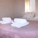 Bright and cozy living room of Flora’s Memories Apartment in central Kavala.