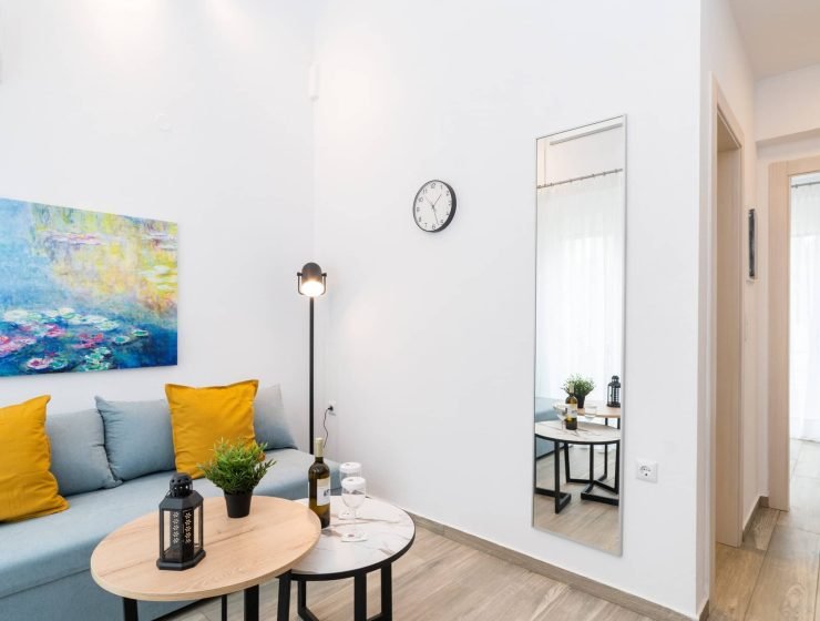 Sunny courtyard of the "Anastasia" apartment with swimming pool, next to Ofrini beach